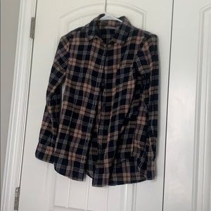 Plaid orange and navy blue flannel